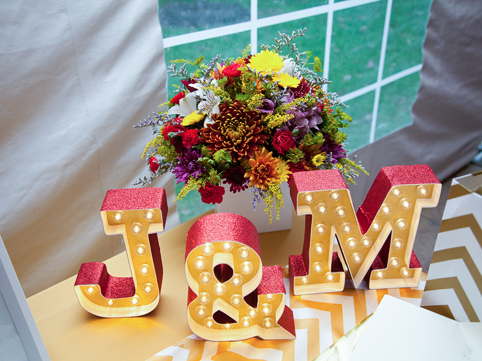 Flowers and a sign at a Bucks County Wedding